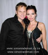 Natasha Sutherland-Hofmeyr wearing Simon Rademan in Rapport, with husband Steve Hofmeyr 